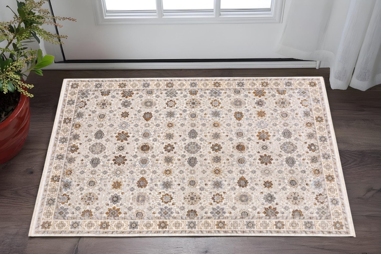 3' X 5' Ivory And Gold Oriental Power Loom Stain Resistant Area Rug With Fringe